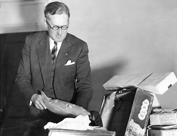 George Easton with a Kingsbury tin toys model of his 1938 LSR holder Thunderbolt