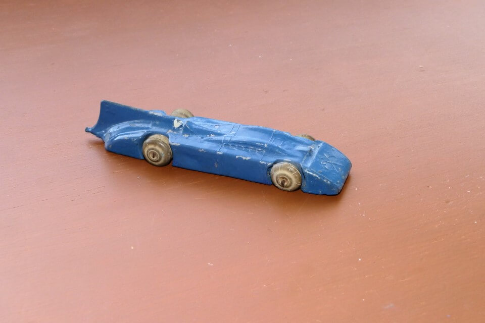 Marked “Made in England by Britains Ltd” Lead. Pre war. This is a 3rd and smaller version of the same car. I do not know whether it was issued before or after #1393 but suspect that it was dropped from production when Britains issued the version with the detailed chassis. It is very hard to find. 137mm
