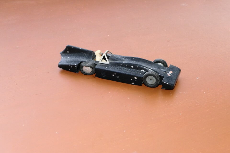 Marked “Marklin Germany” on its Tin base plate. Pre war. Diecast with diecast wheels and rubber tyres. The rubber driver was sold separately as an accessory. Many early Marklins are subject to bad fatigue and actually fall apart. This one is fine but the rubber tyres have perished quite badly.
