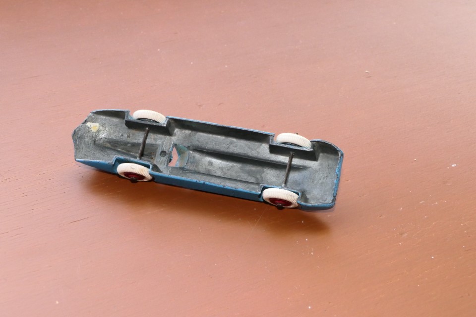 Underside view of car in fig.64 showing that this is the version with no clockwork motor and no winding key hole.